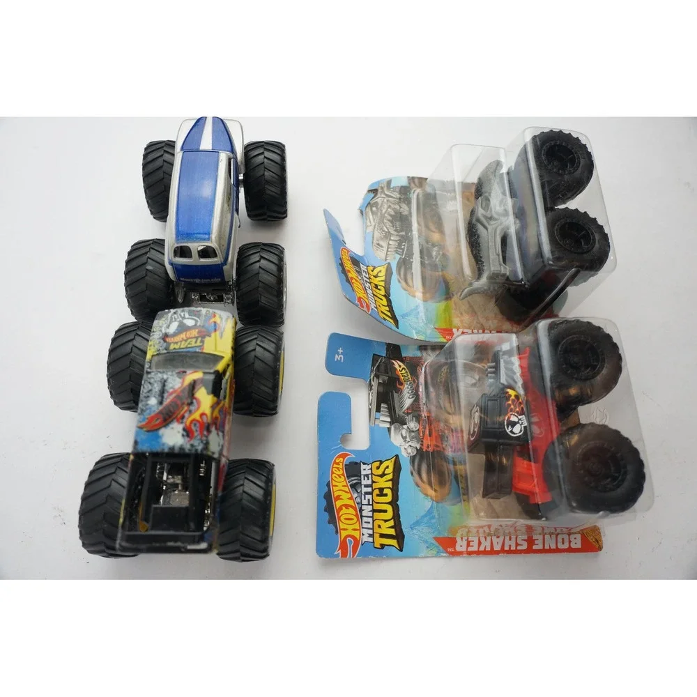 Hot Wheels Monster Trucks Lot‎ of 4 Grave Digger Bone Shaker Mega-Wrex Good